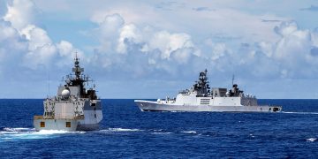 Indian Navy warships INS Kadmaat and INS Shivalik conduct maritime manoeuvres with HMAS Warramunga as they sail towards Darwin for AUSINDEX 2021.
