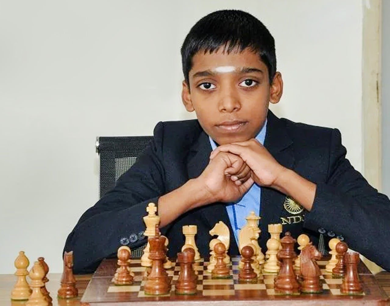 Rameshbabu Praggnanandhaa with Viswanathan Anand. Rameshbabu Praggnanandhaa  (born 10 August 2005) is an Indian chess player. A chess prodigy, he is  the, By Bangladesh IQ Olympiad