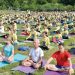 Hundreds gather at Washington Monument to celebrate International Yoga Day 