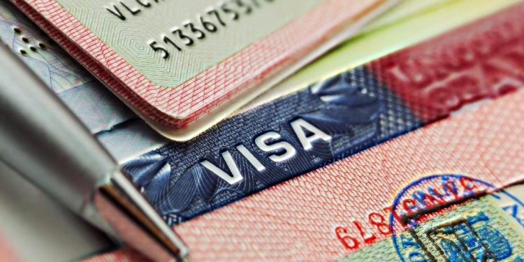 Indian-Origin Men Indicted for Visa Fraud Conspiracy: An Overview 1 US Set to Launch Paperless Visa Following Successful Pilot Program