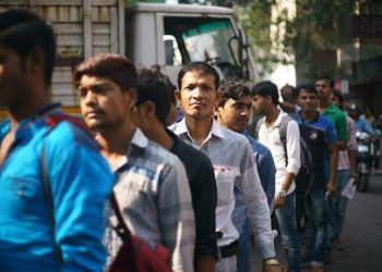 Indians are fleeing their growing economy to work abroad – even in conflict zones. Here’s how to create more jobs at home