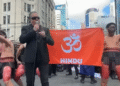 Outrage as NZ church leader burns religious and cultural flags at anti-immigration protest