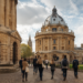 Rhodes Scholarship 2027: Applications Open for Indian Students at Oxford 7 Postgraduate students walking through University of Oxford campus, Rhodes Scholarship 2027 India