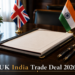 Signed bilateral trade agreement and pens on a conference table, India UK trade deal 2026.