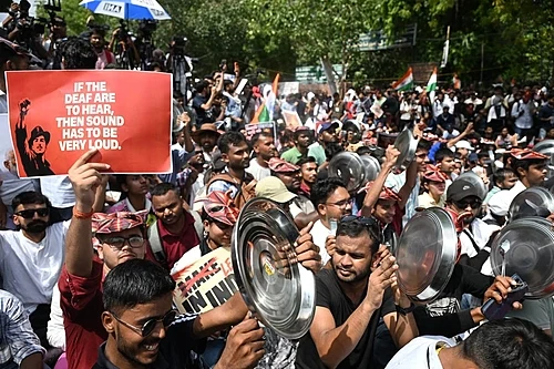 500px CJP Protestors holding Bhagat Singh posters