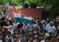 India's Cockroach Protesters March on Parliament. Police Fire Tear Gas. 12 Cockroach Janta Party