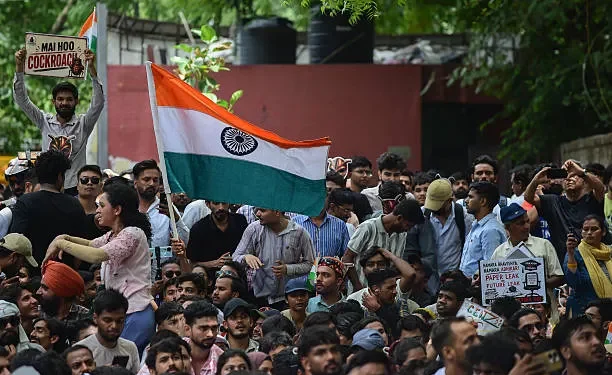 India's Cockroach Protesters March on Parliament. Police Fire Tear Gas. 1 Cockroach Janta Party