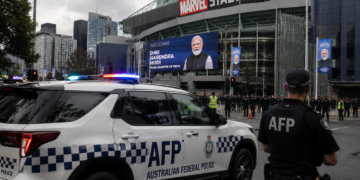 Australian Federal Police vehicle outside Marvel Stadium, Melbourne Meets Modi visit security AFP warning 2026