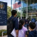 US Embassy Confirms Alarming Rule: Every Child Needs a Visa Interview Too 9 Indian parent and child at US visa application centre, US visa interview minors US embassy rule