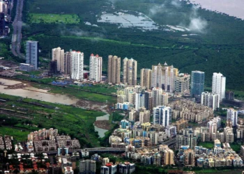 NRI property rules India 2026 - Navi Mumbai residential skyline