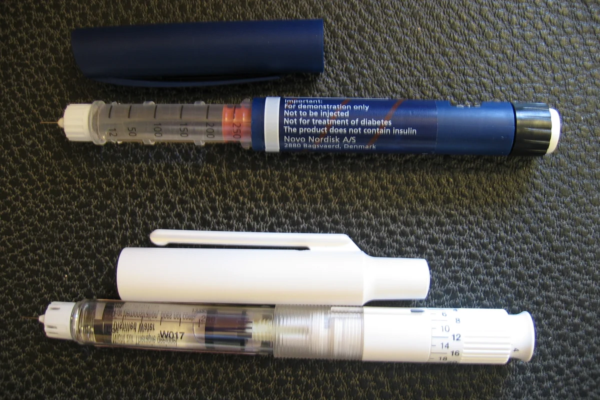 Pre-filled insulin pen on a light background