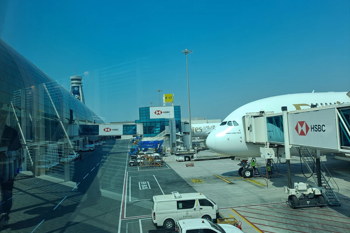 An aircraft and boarding bridges at Dubai International Airport Terminal 3