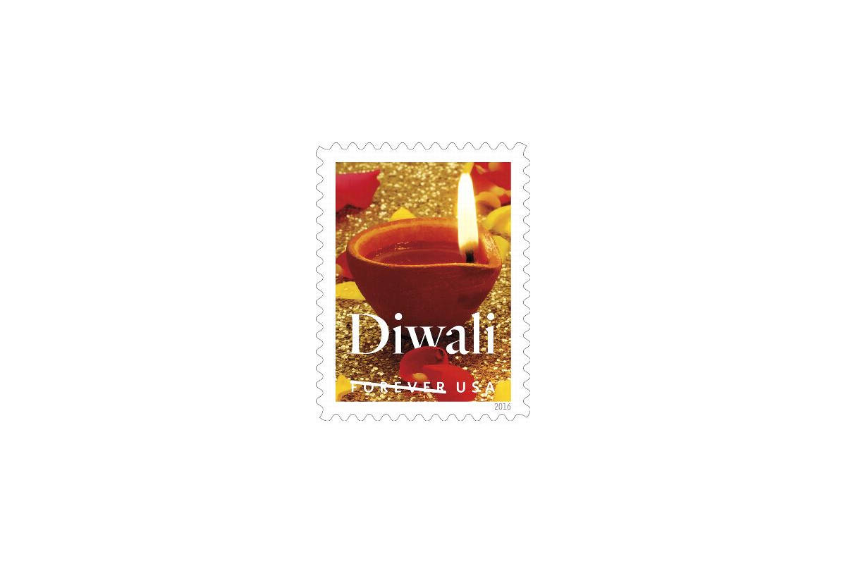 The original 2016 Diwali Forever stamp showing a diya and flower petals