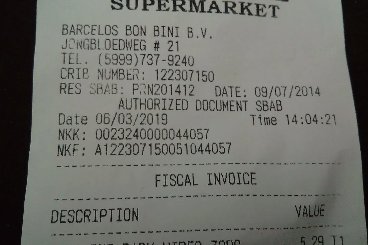 Printed supermarket receipt showing transaction information