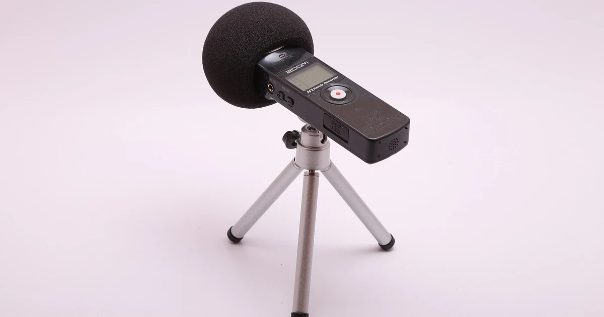 Portable audio recorder on a tripod illustrating a family oral history