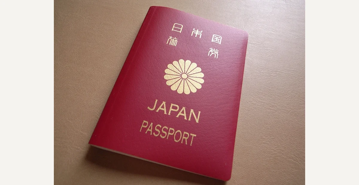 Crimson Japanese passport on a table, illustrating October passport rankings
