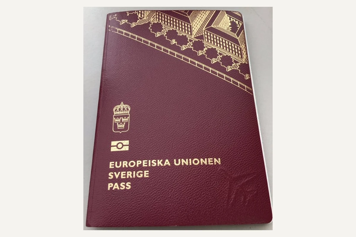 Burgundy Swedish passport cover with gold lettering