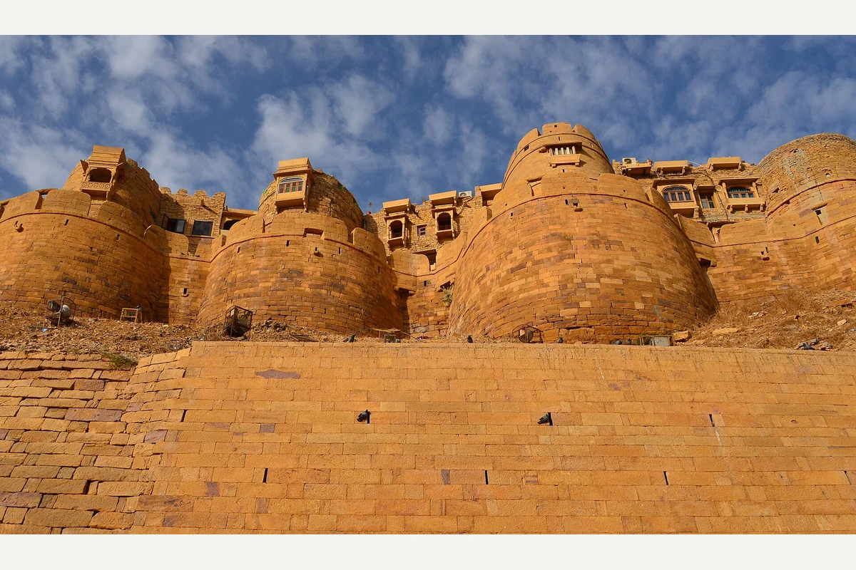 Golden sandstone walls and towers of Jaisalmer Fort in Rajasthan