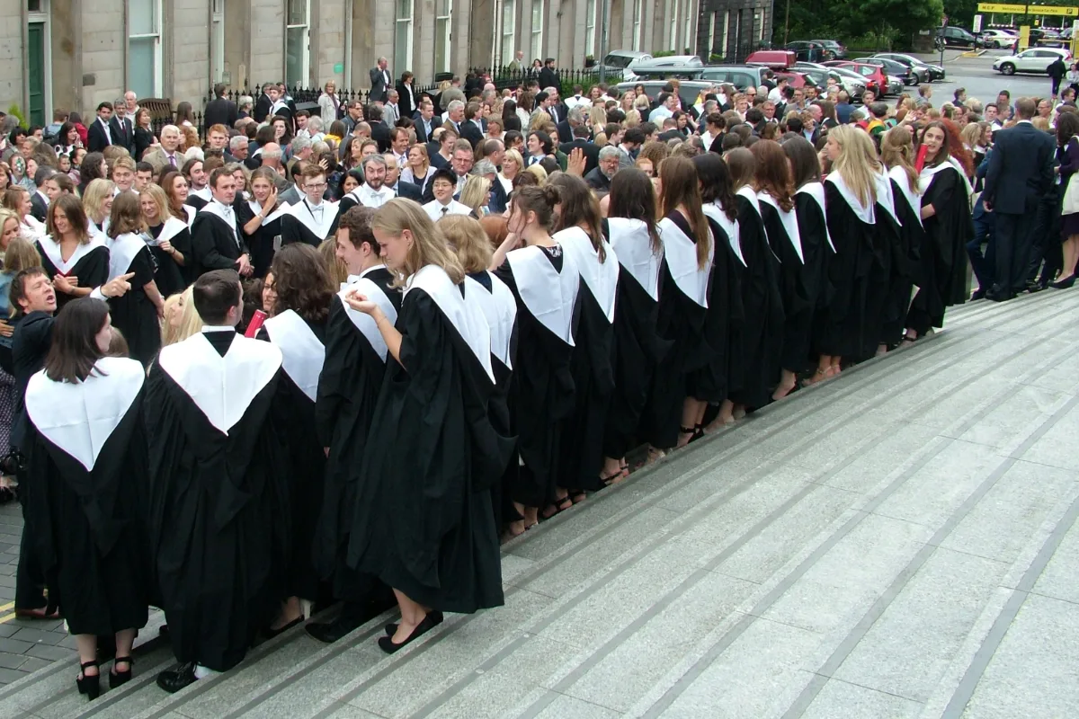 Graduates in gowns gathering for a University of Edinburgh graduation day