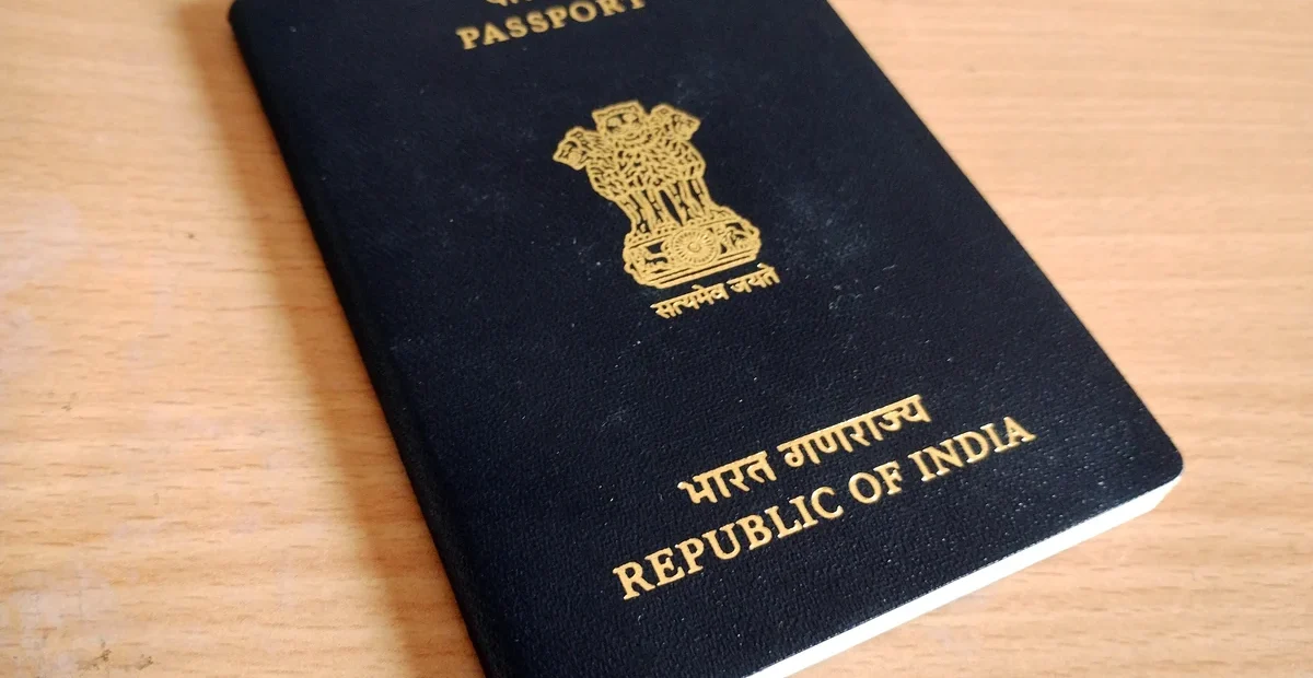 Indian passport cover, illustrating migrant worker rights and access to identity documents
